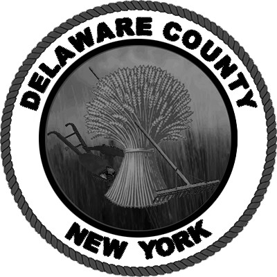Delaware County seal: wheat, plow, rake, circular text border